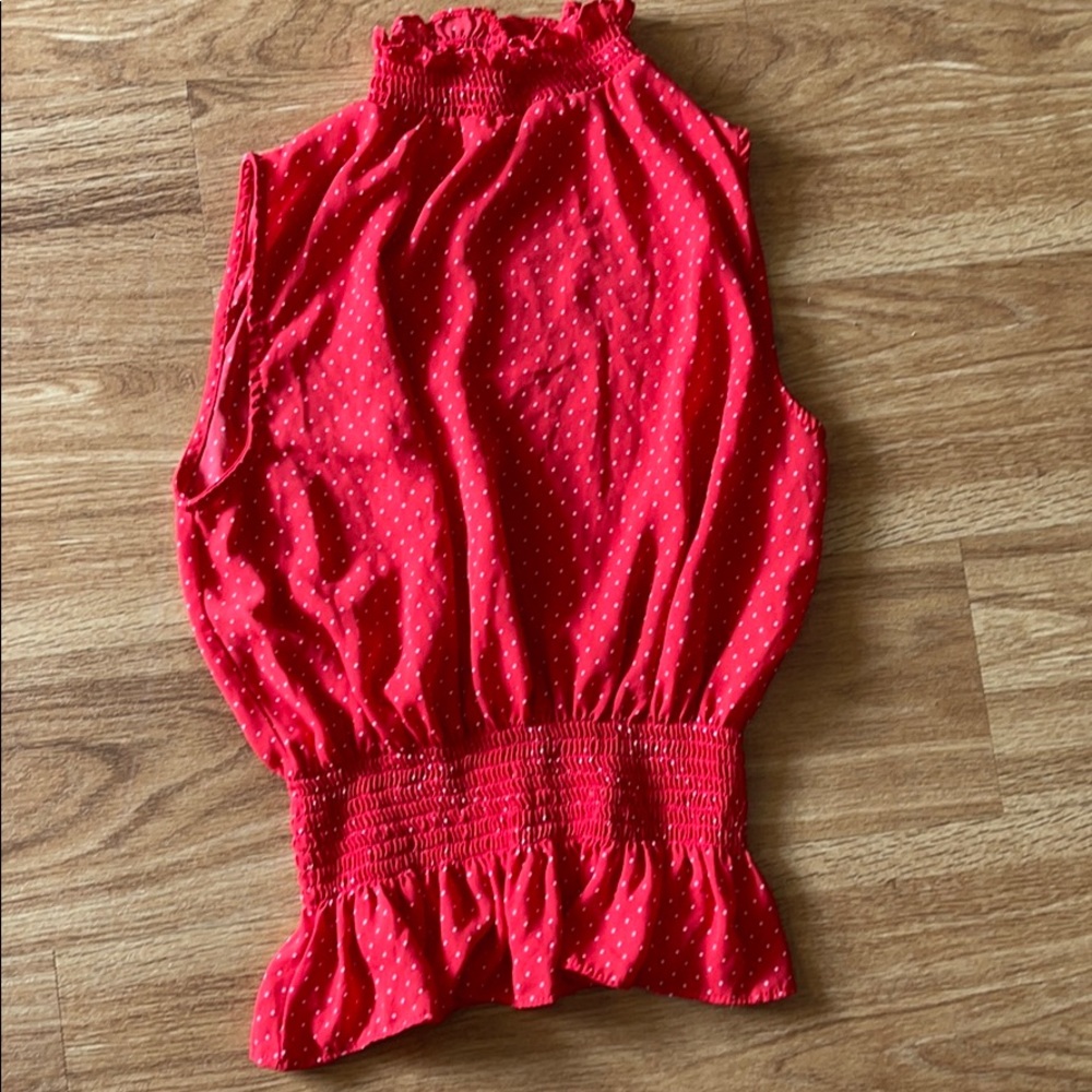 Red dot sleeveless turtle neck peplum blouse